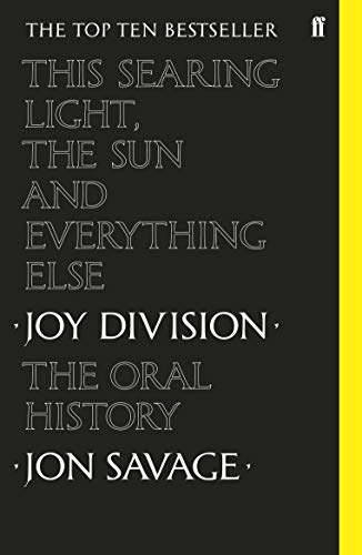 Black book cover with white text: "This Searing Light, Joy Division.