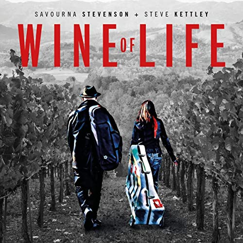 CD cover: two figures walking through a vineyard, carrying cases.