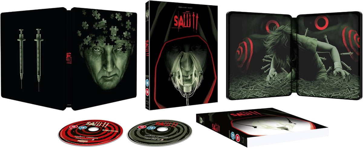 SteelBook case for "Saw II" with disturbing imagery, discs included.