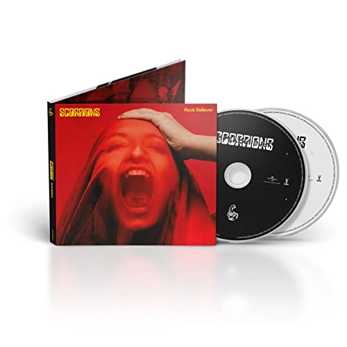 Scorpions "Rock Believer" CD with cover art of a screaming face.