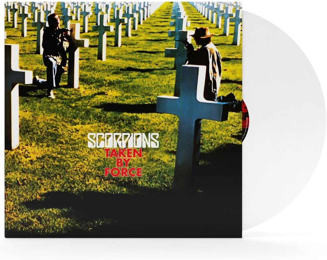 Scorpions "Taken By Force" vinyl record cover with cemetery scene and white disc.