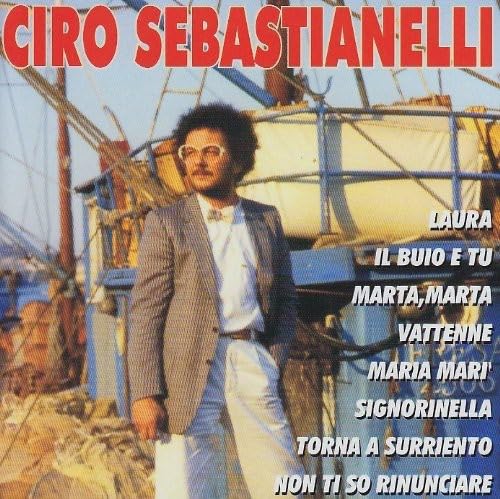 CD cover featuring Ciro Sebastianelli in a suit by boats, song list right.