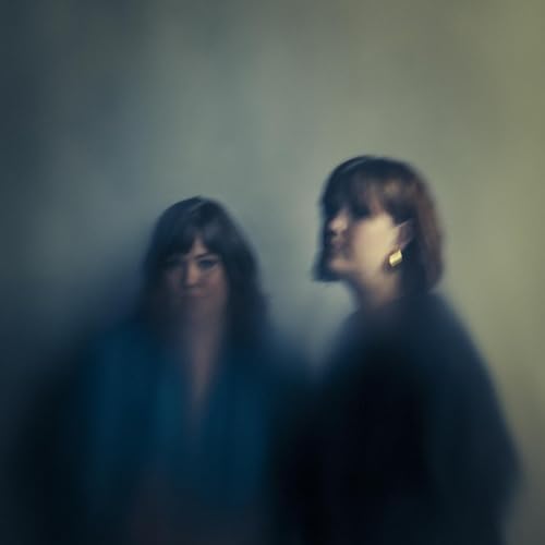 Two women with blurred faces, album cover for Secret Sisters CD.