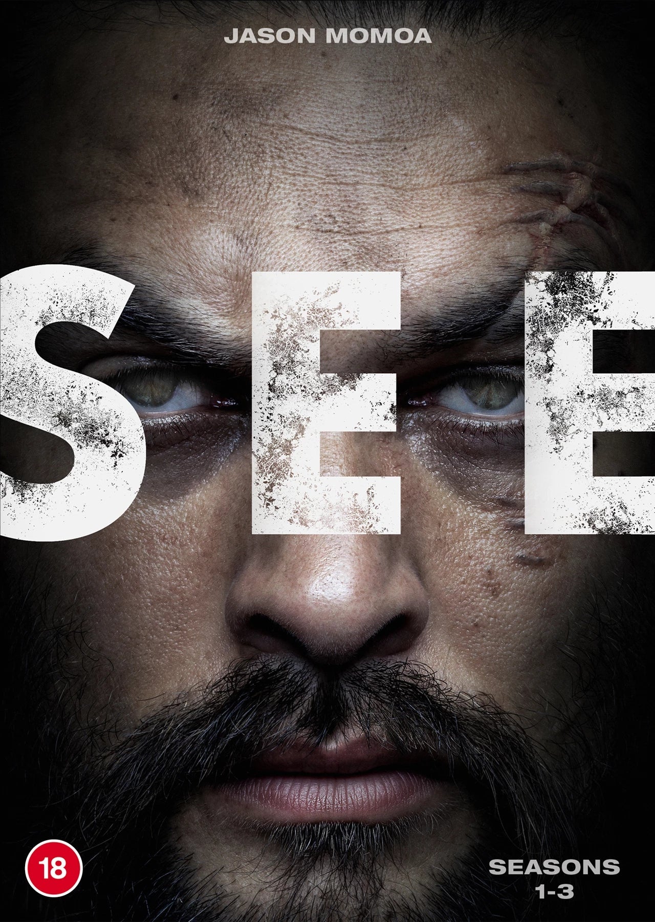 Close-up of intense eyes and face with "SEE" text overlay, DVD cover for seasons 1-3.
