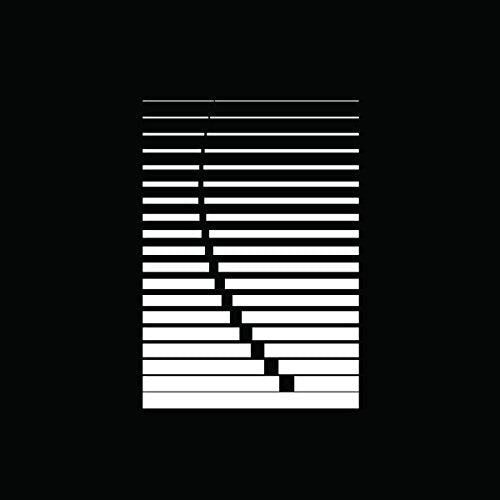 The image shows a barcode on a black background. Alt text: Black and white barcode on a black background.