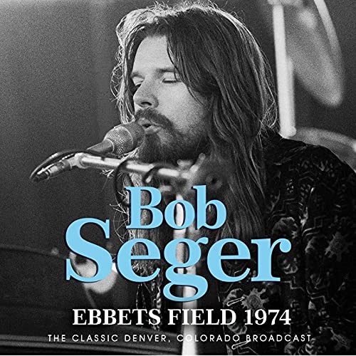 Bob Seger singing into a microphone, album cover for "Ebbets Field 1974".