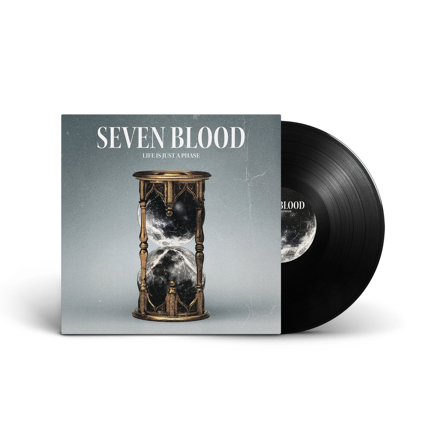 Vinyl record and album cover featuring an ornate hourglass on a grey background.