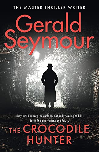 Book cover: dark tunnel, silhouetted figure with hat and coat.