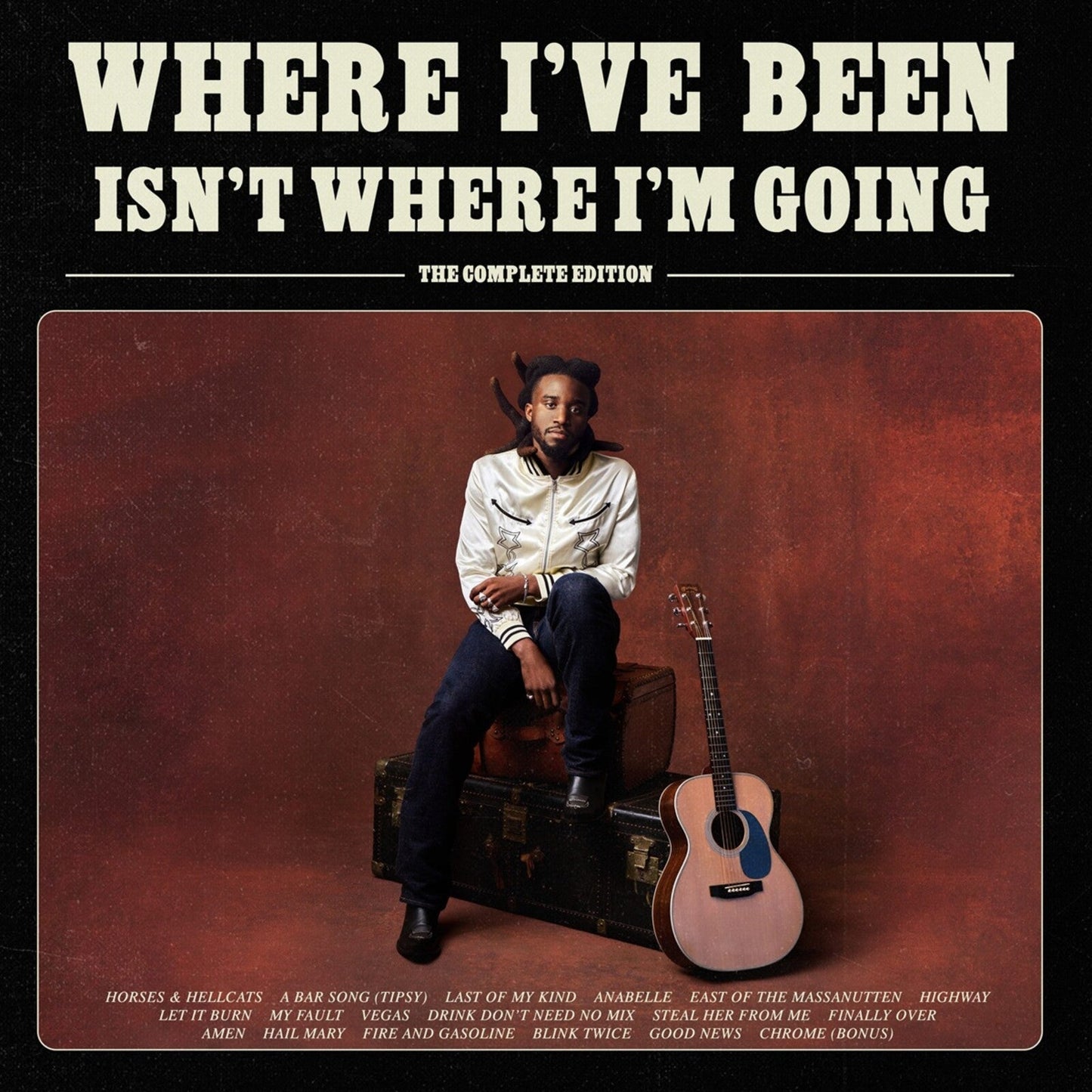 Shaboozey album cover: artist with guitar, vintage trunks, and bold text.