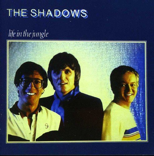 "Album cover featuring three smiling men against a blue background with 'The Shadows' text."