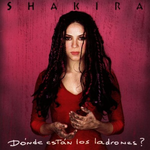 AlbumSLalbum cover of Shakira's Dónde Están Los Ladrones? featuring her in a red shirt.