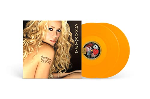 Shakira’s “Laundry Service” vinyl record with orange discs and cover art.