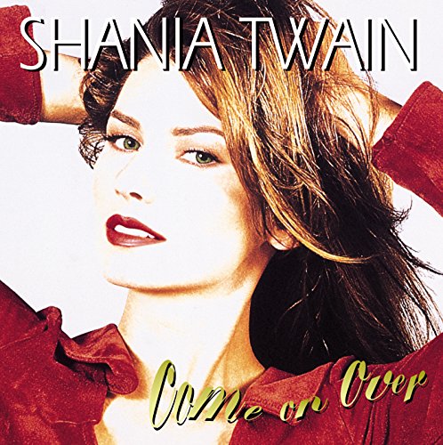 Shania Twain poses with hands behind her head on the Come On Over album cover.