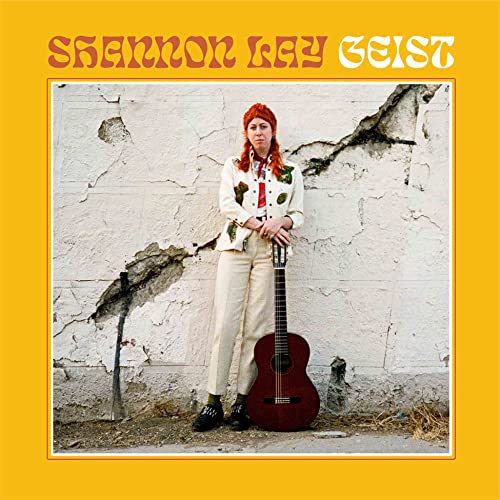 Album cover for Shannon Lay’s “Geist” featuring a woman with a guitar.