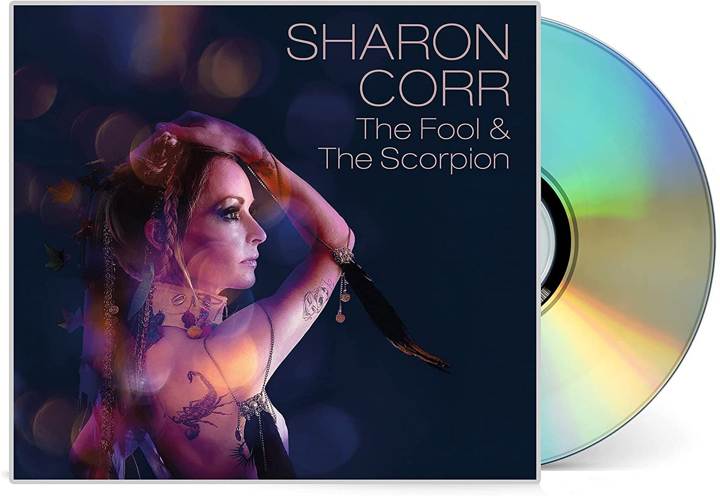 "Album cover featuring a woman with tattoos, holding her hair, against a dark background."
