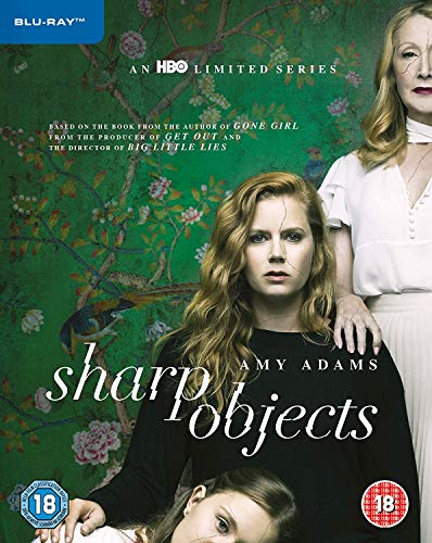 Blu-ray cover for Sharp Objects featuring Amy Adams against a green floral wallpaper background.
