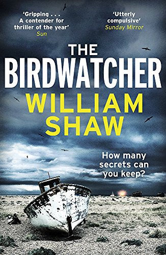 Book cover for The Birdwatcher by William Shaw featuring a boat on a beach.