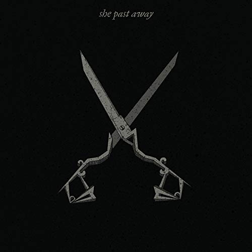 Dark album cover featuring stylized, crossed scissors against a black background.