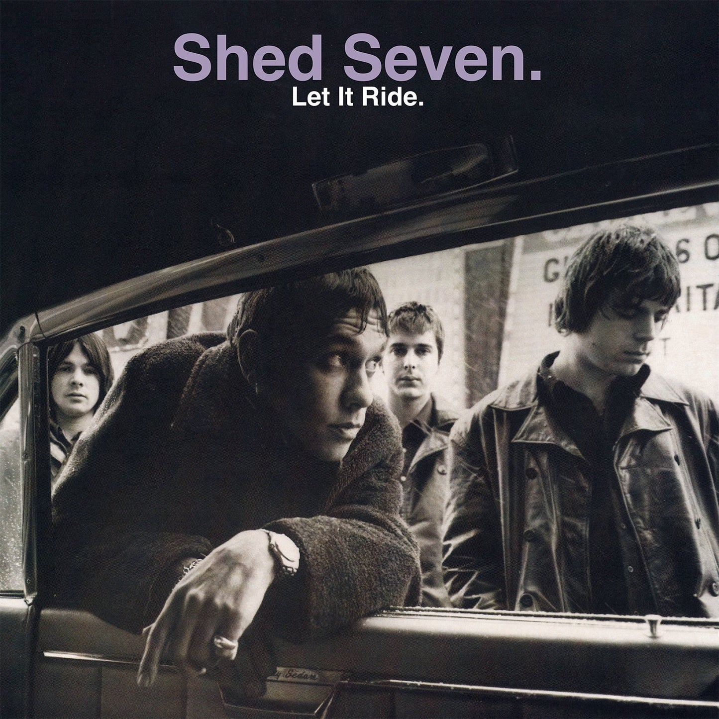 Black and white album cover featuring four young men in a car.
