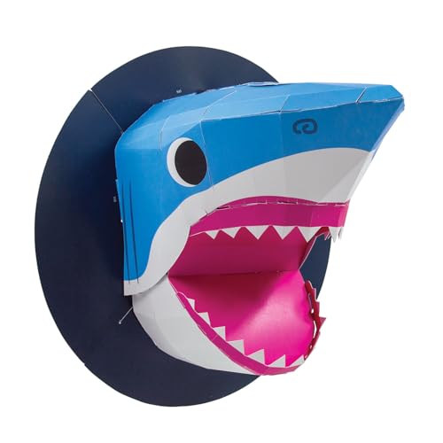 Blue and white papercraft shark head mounted on a dark circle.