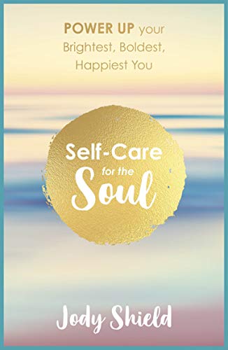 Book cover with gold text on a blurred pastel background.