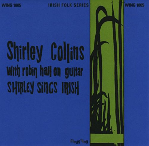 Blue vinyl album cover with black text and green, black graphic design.