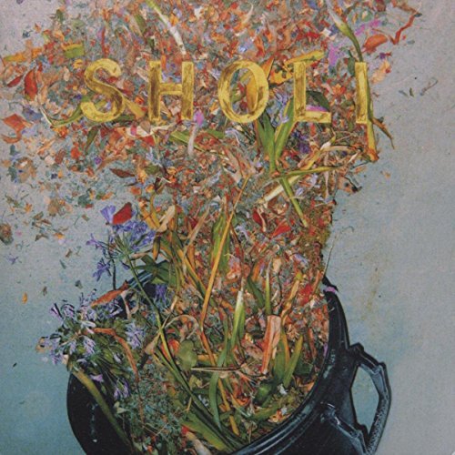 "Album cover with a black pot overflowing with flowers and the word 'SHOLI'."