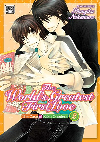 Two young men embrace, manga volume two cover with pink title text.