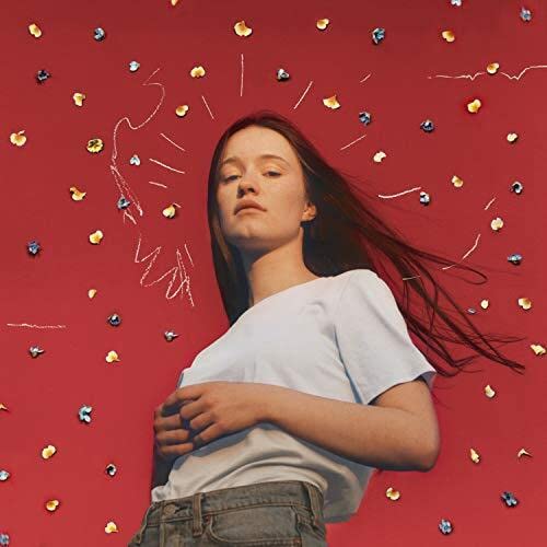 Album cover for Sigrid’s “Sucker Punch” featuring a woman with falling confetti.