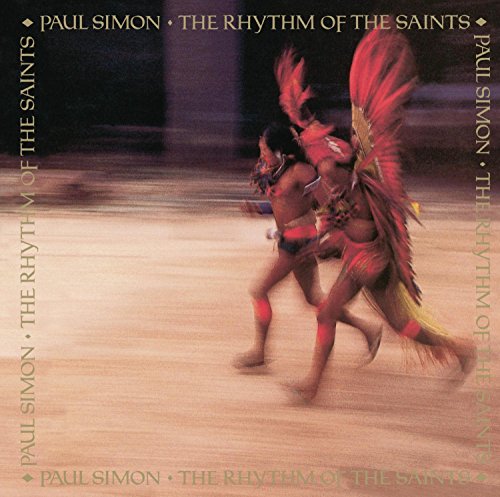 Paul Simon album cover featuring dancers in vibrant Brazilian carnival costumes.
