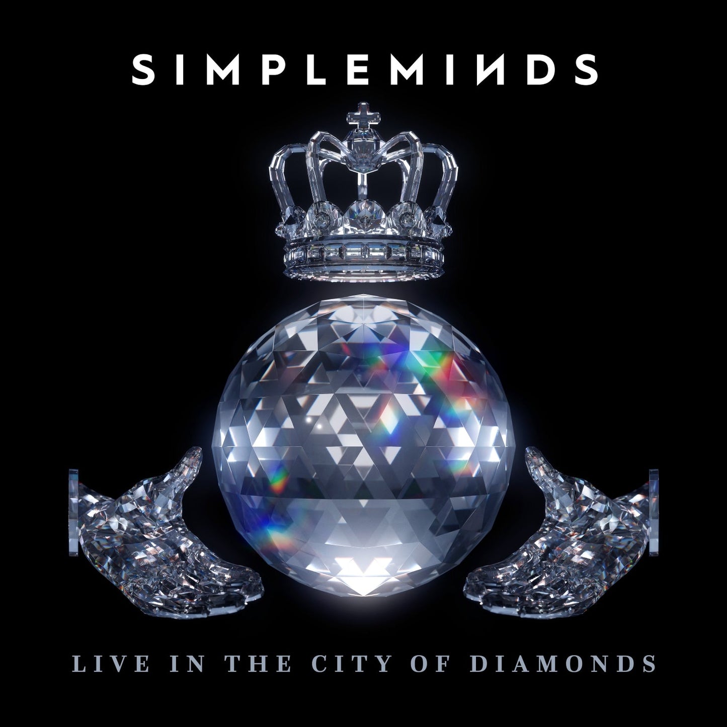 Simple Minds album cover: crystal crown, disco ball, and hands.