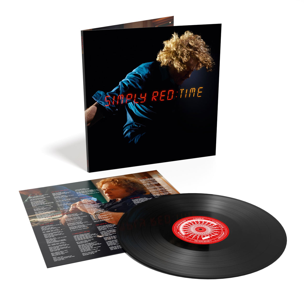 Simply Red "Time" vinyl record and sleeve with musician portrait.