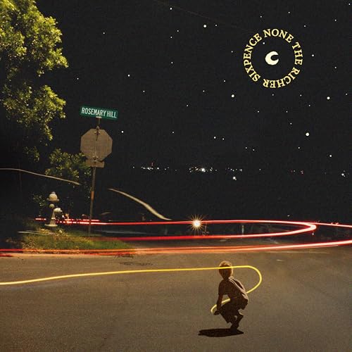 Album cover: nighttime street scene with a child and street sign.