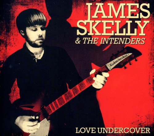 Album cover featuring a man playing guitar against a red background with text overlay.