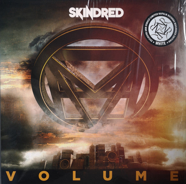 White vinyl record for Skindred’s “Volume” album, featuring abstract artwork.