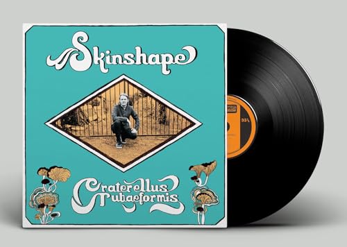 Vinyl record with album cover featuring a person and mushrooms.