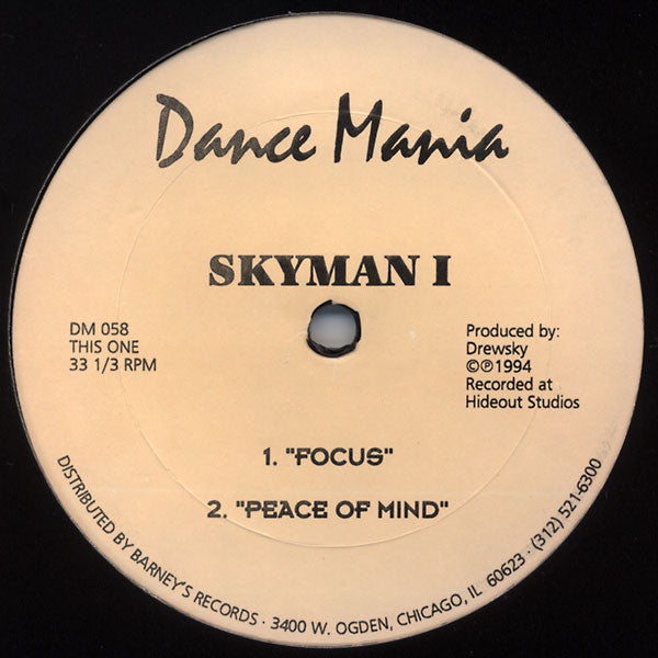Black vinyl record label with white text: "Dance Mania" and "Skyman I".