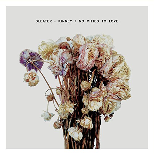 Album cover for Sleater-Kinney’s “No Cities To Love” featuring dried flowers.