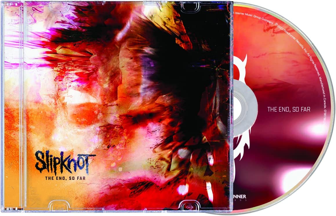 "CD case with red and orange abstract cover art, partially open, displaying the disc."
