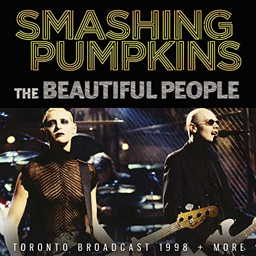 Smashing Pumpkins album cover featuring band members and bold text.