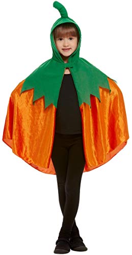Girl wearing an orange pumpkin cape with a green hooded stem.