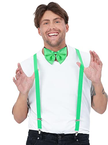 Man wearing green bow tie and braces, smiling at the camera.