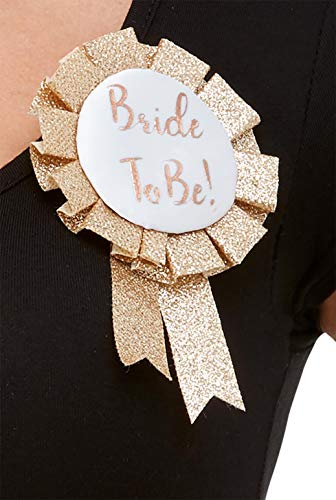 Rose gold “Bride To Be” rosette pin attached to black fabric.
