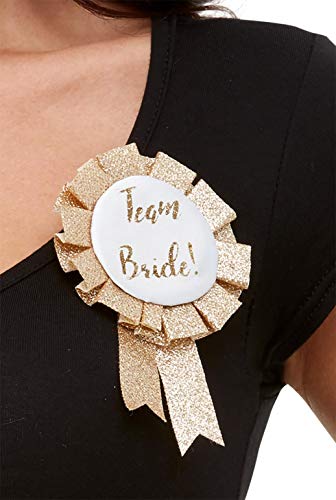 Rose gold “Team Bride” rosette pinned to a black garment.