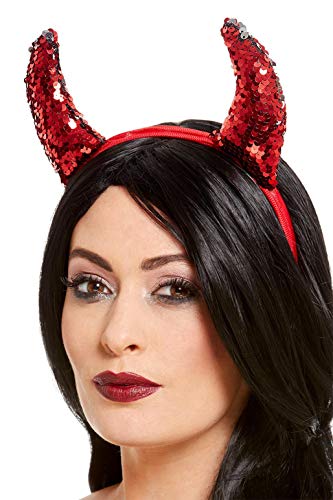 Red sequin devil horns on a headband worn by a woman.