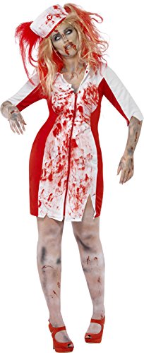 A woman dressed as a bloody zombie nurse with a red and white costume.