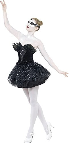 Woman in a black sparkly tutu, mask, and white tights, posing in a ballet stance.