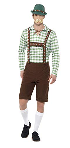 Man wearing a green and white checkered Bavarian costume with hat.