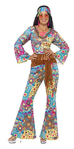 Woman wearing a colorful 1960s-style hippie costume with bell-bottoms, headband, and peace sign necklace.