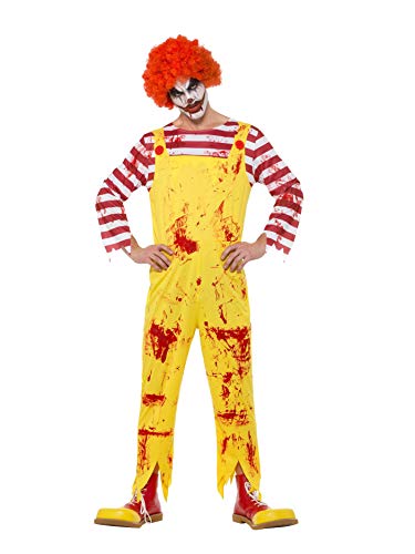 Person in a blood-splattered clown costume with orange wig and red shoes.